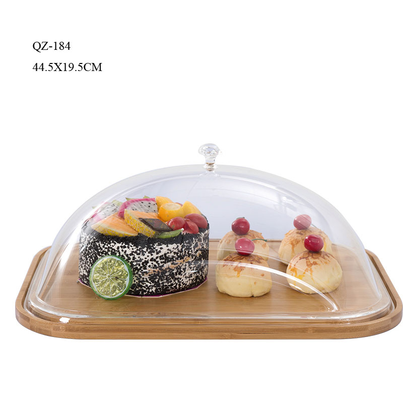 Bamboo cheese board with food cover